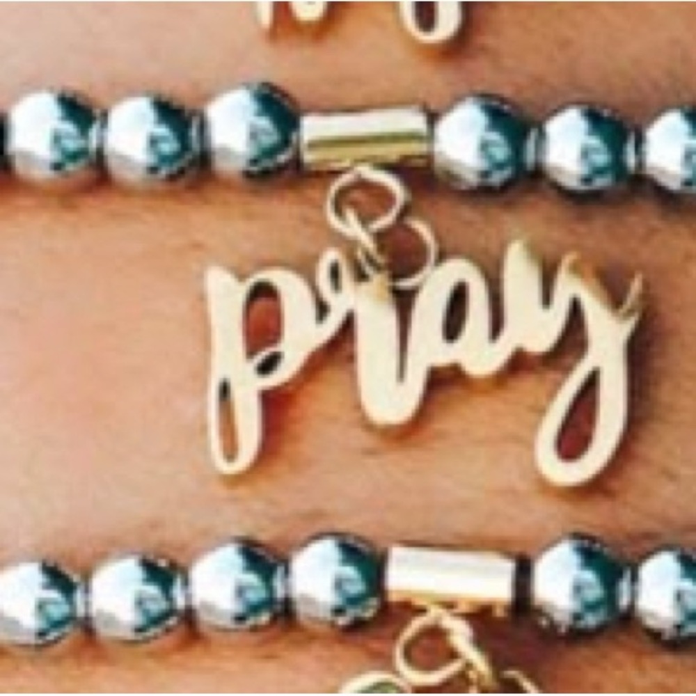 Elegant Gold and Silver 'Pray' Bracelet